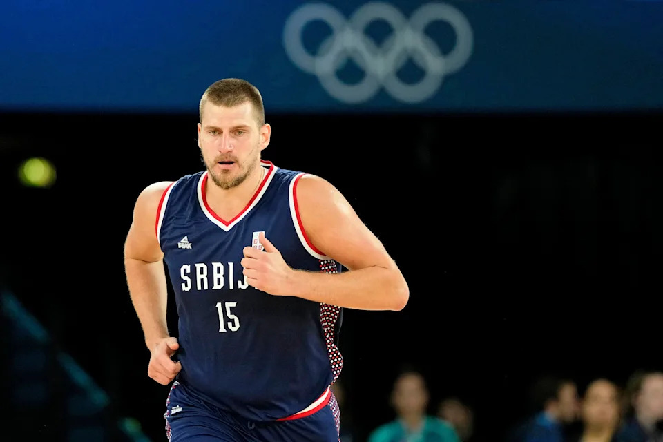 Aug 10, 2024; Paris, France; Serbia power forward Nikola Jokic (15) runs up the court against Germany in the men's basketball bronze medal game during the Paris 2024 Olympic Summer Games at Accor Arena. Mandatory Credit: Kyle Terada-USA TODAY Sports