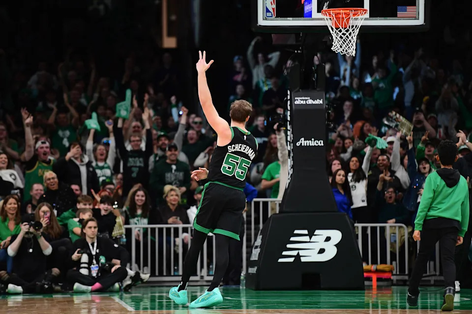Mar 18, 2025; Boston, Massachusetts, USA; Boston Celtics forward Baylor Scheierman (55) reacts after hitting a three point shot during the second half against the Brooklyn Nets at TD Garden. Mandatory Credit: Bob DeChiara-Imagn Images