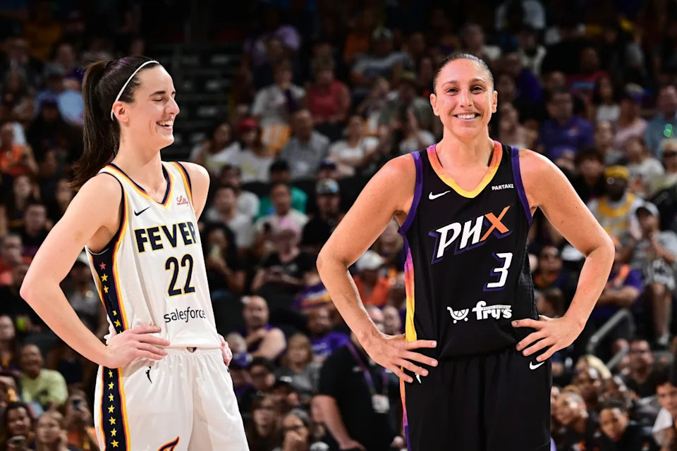 PHOENIX, AZ - JUNE 30: Caitlin Clark #22 of the Indiana Fever and Diana Taurasi #3 of the Phoenix Mercury smile during the game on June 30, 2024 at Footprint Center in Phoenix, Arizona. (Photo by Kate Frese/NBAE via Getty Images)Kate Frese/Getty Images