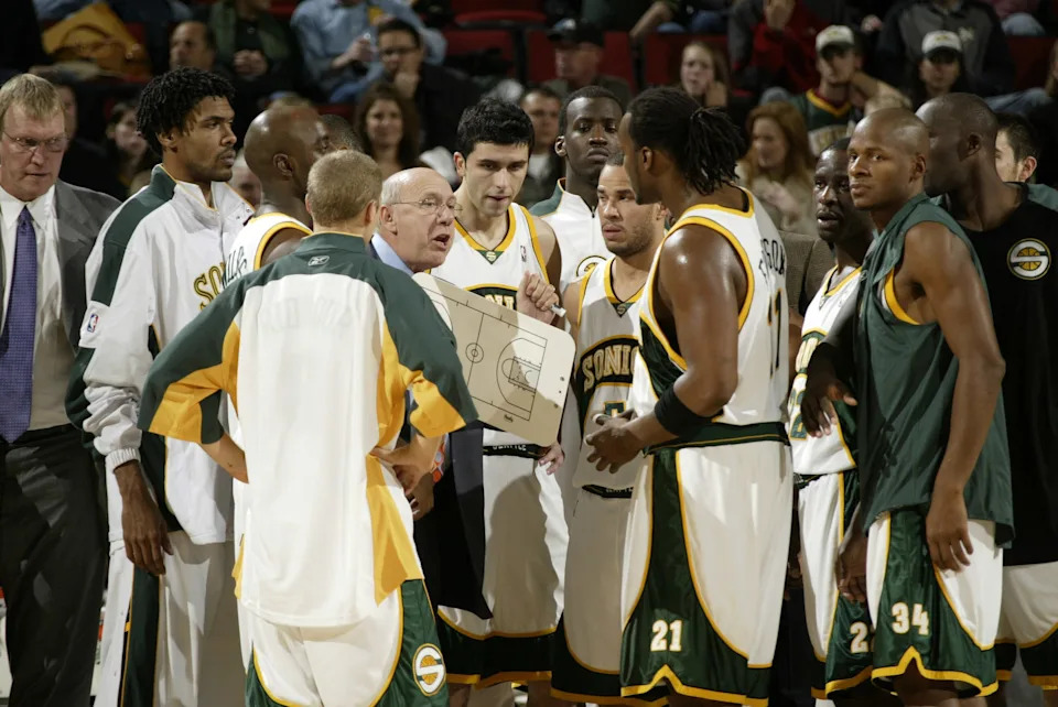 SEATTLE - NOVEMBER 2: Head coach Bob Weiss (C - wearing glasses) of the Seattle SuperSonics talks to his players in a hudle during a timeout against the Los Angeles Clippers November 2, 2005 at Key Arena in Seattle, Washington. The Clippers won 101-93. NOTE TO USER: User expressly acknowledges and agrees that, by downloading and/or using this photograph, User is consenting to the terms and conditions of the Getty Images License Agreement. (Photo by Otto Greule Jr/Getty Images)