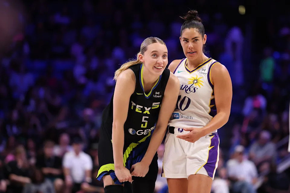 ARLINGTON, TEXAS - AUGUST 15: Paige Bueckers #5 of the Dallas Wings speaks with Kelsey Plum #10 of the Los Angeles Sparks \d2h at College Park Center on August 15, 2025 in Arlington, Texas. NOTE TO USER: User expressly acknowledges and agrees that, by downloading and or using this photograph, User is consenting to the terms and conditions of the Getty Images License Agreement. (Photo by Stacy Revere/Getty Images)