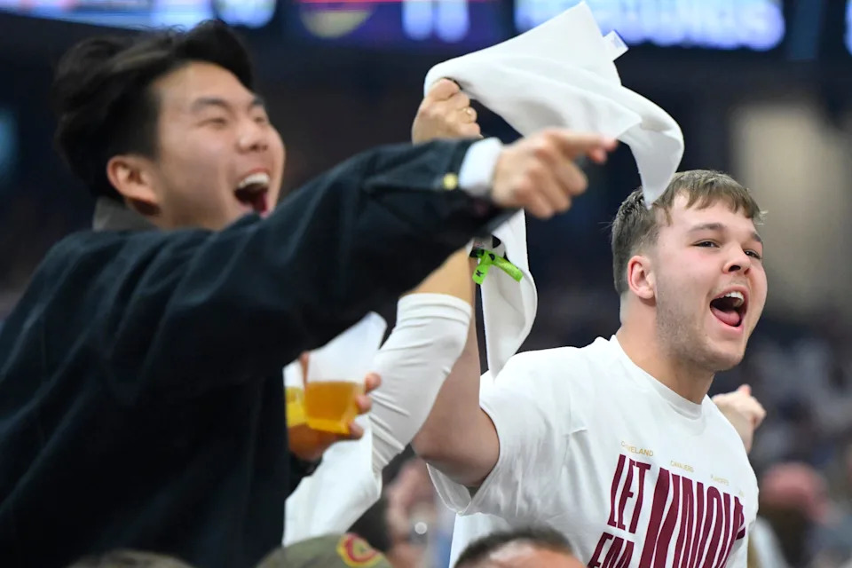Apr 20, 2025; Cleveland, Ohio, USA; Fans cheer during a game between the Cleveland Cavaliers and the Miami Heat in the first quarter at Rocket Arena. Mandatory Credit: David Richard-Imagn Images