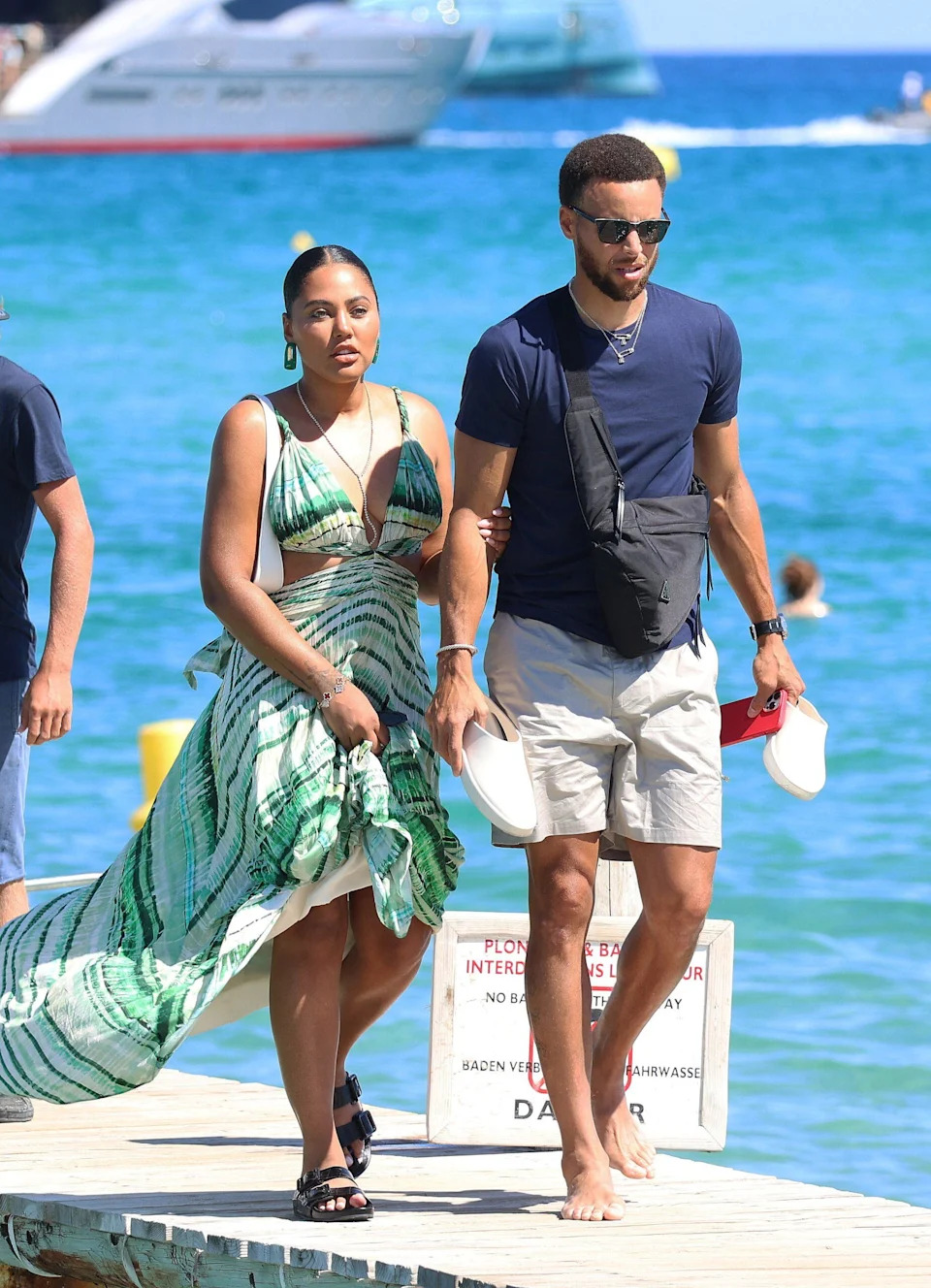 Steph Curry and Ayesha Curry on the beach .