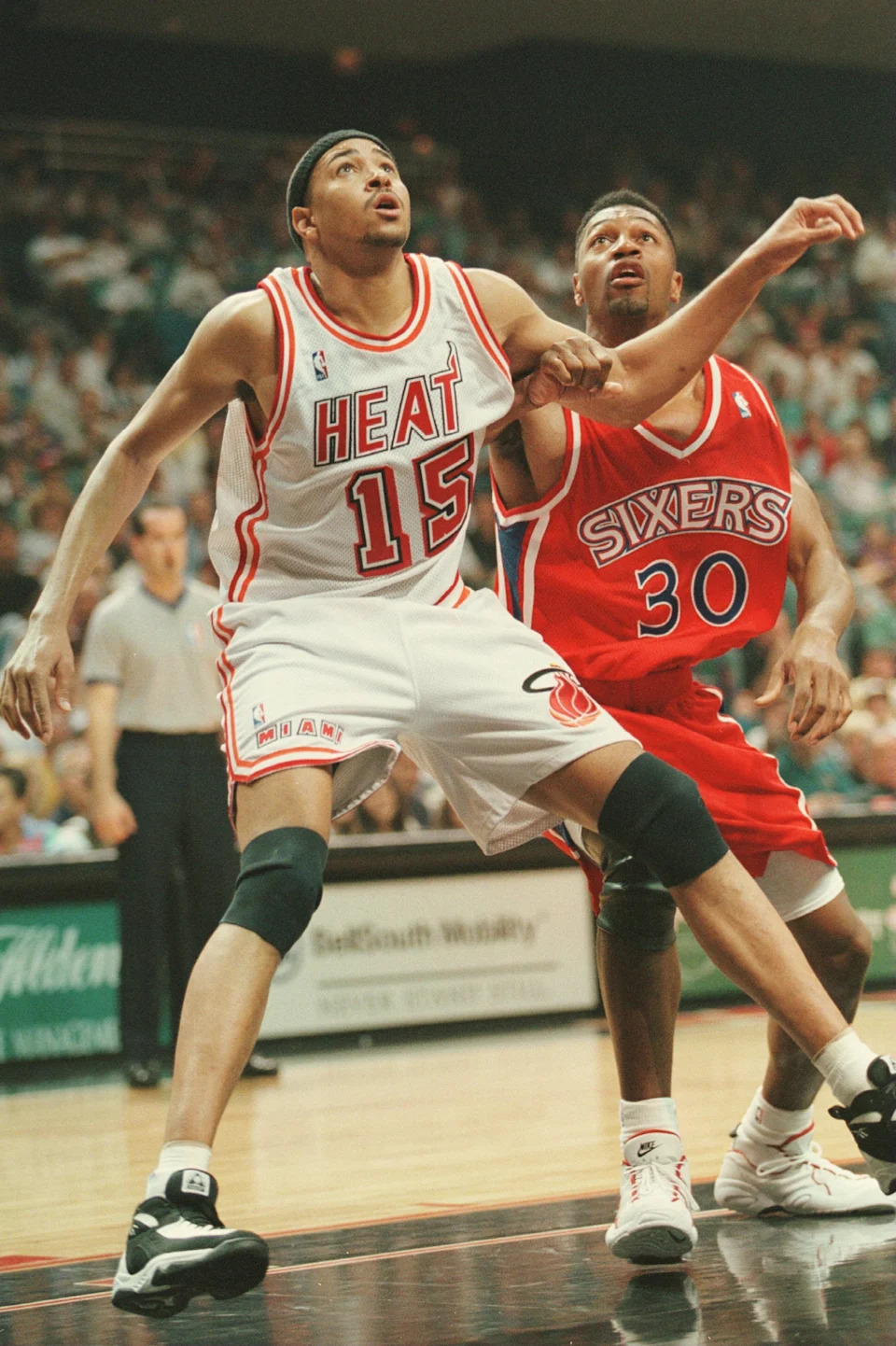 25 Feb 1996: Chris Gatling (left) of the Miami Heat battles with Tony Massenburg of the Philadelphia 76ers during the Heat 108-101 win at Miami Arena in Miami, Florida.