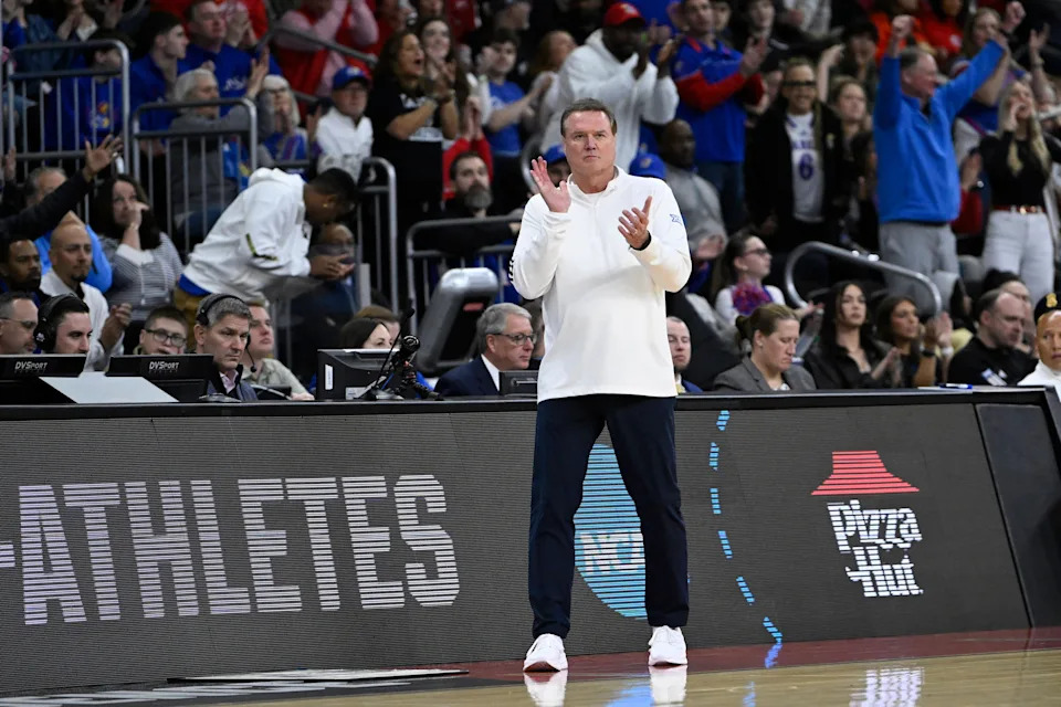 March 20, 2025; Providence, RI; Kansas basketball head coach Bill Self reacts during the first half of a game against Arkansas at Amica Mutual Pavilion.