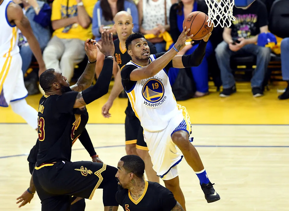 Jun 19, 2016; Oakland, CA, USA; Golden State Warriors guard Leandro Barbosa (19) shoots the ball against Cleveland Cavaliers forward LeBron James (23) during the second quarter in game seven of the NBA Finals at Oracle Arena. Mandatory Credit: Bob Donnan-USA TODAY Sports