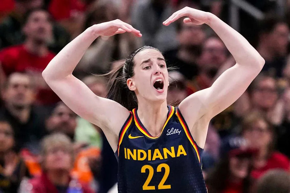 Indiana Fever guard Caitlin Clark (22) gets the crowd excited Tuesday, May 20, 2025, during a game between the Indiana Fever and the Atlanta Dream at Gainbridge Fieldhouse in Indianapolis. The Atlanta Dream defeated the Indiana Fever, 91-90.Grace Smith/IndyStar.