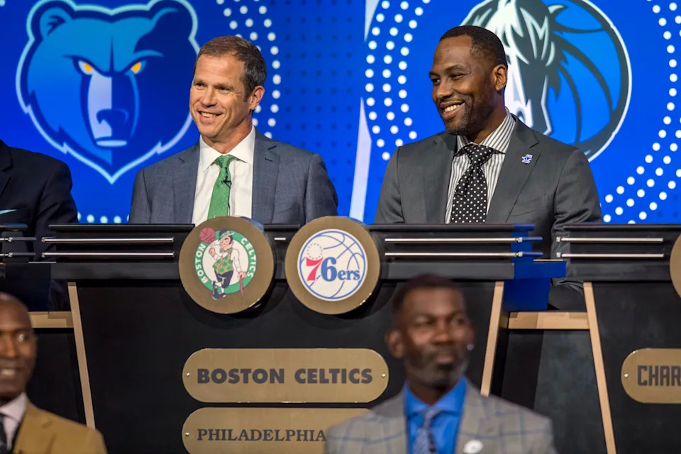 May 15, 2018; Chicago, IL, USA; Boston Celtics Team President Rich Gotham (left) and Philadelphia 76ers GM of Delaware Blue Coats Elton Brand (right) smile while sitting in their shared podium seat during the 2018 NBA Draft Lottery at the Palmer House Hilton. Mandatory Credit: Patrick Gorski-USA TODAY Sports