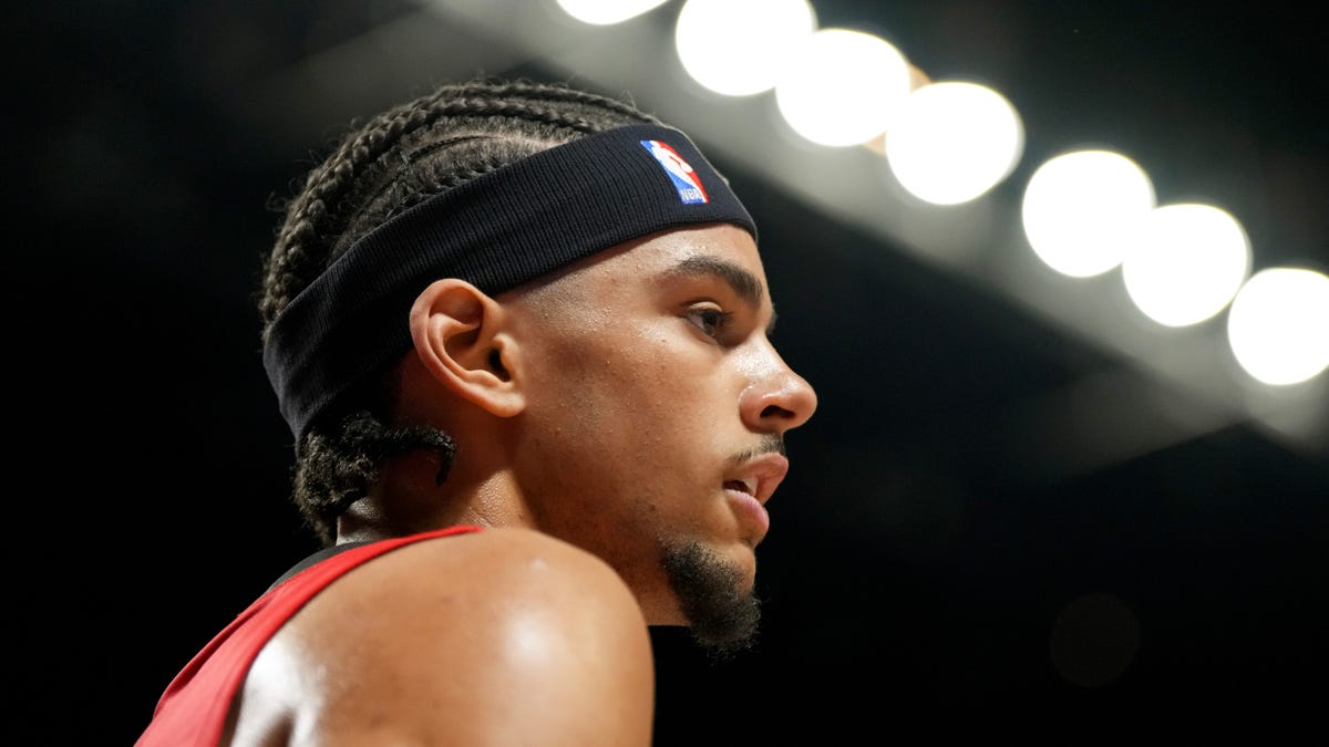 Asa Newell to keep jersey number from college, high school