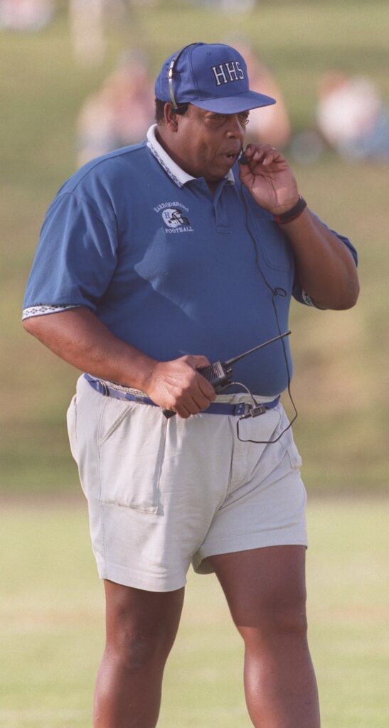 Alvis Johnson, Head Football Coach and Athletic Director at Harrodsburg High School during action in the 1997 recreation bowl game between Harrodsburg High School and Bell County High School played in Mt. Sterling, Kentucky on Sat. Aug, 23, 1997 - Photo by Frank Anderson, courtesy of the Lexington Herald-Leader