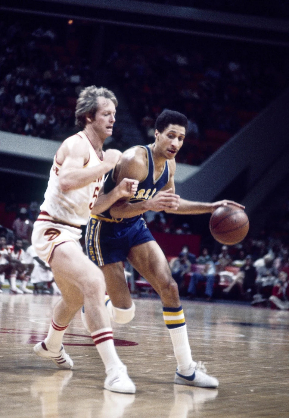 Unknown date; Atlanta, GA, USA; FILE PHOTO; Golden State Warriors guard Phil Smith (20) is defended by Atlanta Hawks forward Tom Van Arsdale (5) at The Omni. Mandatory Credit: Manny Rubio-USA TODAY Sports