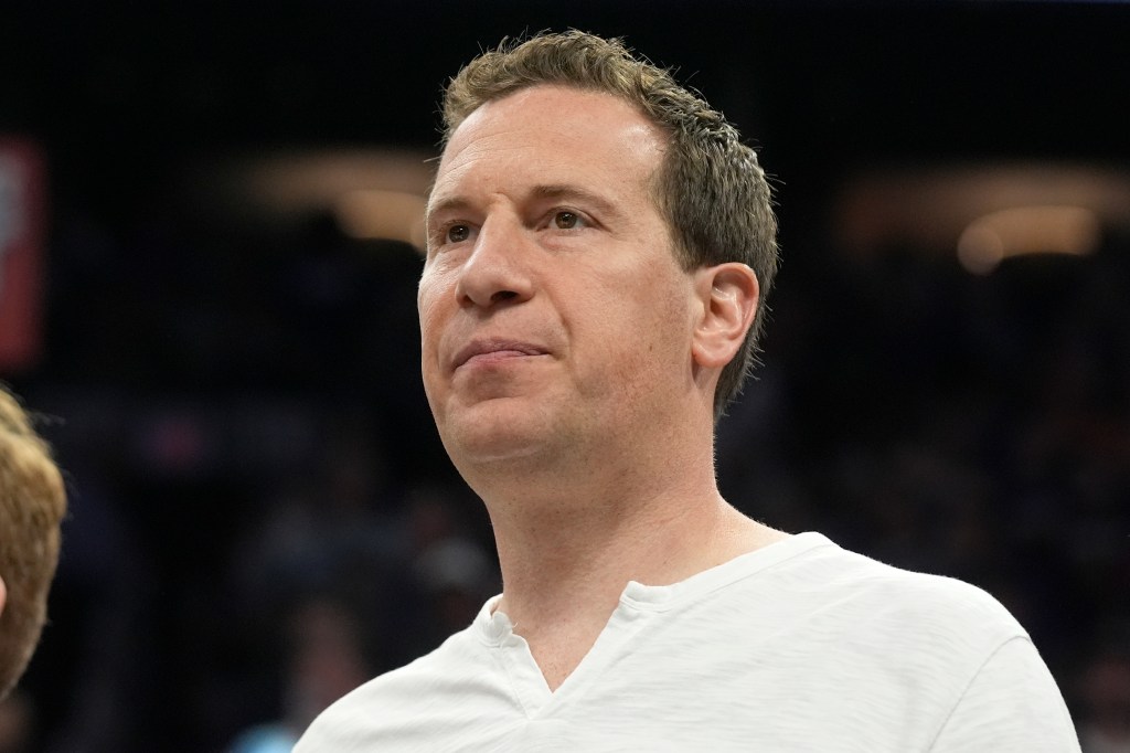 Phoenix Suns owner Mat Ishbia watches players warm up prior to Game 4 of an NBA basketball first-round playoff series against the Minnesota Timberwolves, April 28, 2024, in Phoenix. 