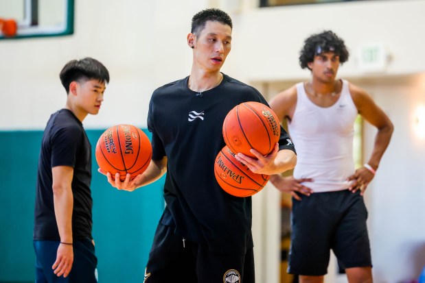 Former NBA star Jeremy Lin teaches basketball skills during his NextGen college basketball camp at the Pinewood Activities Center in Palo Alto, Calif., on Saturday, Aug. 2, 2025. (Ray Chavez/Bay Area News Group)
