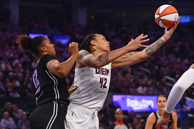 Atlanta Dream's Brittney Griner (42) reaches for a rebound against Golden State Valkyries' Lliana Rupert (12) in the first quarter of their WNBA game at Chase Center in San Francisco, Calif., on Sunday, Aug. 17, 2025. (Jose Carlos Fajardo/Bay Area News Group)