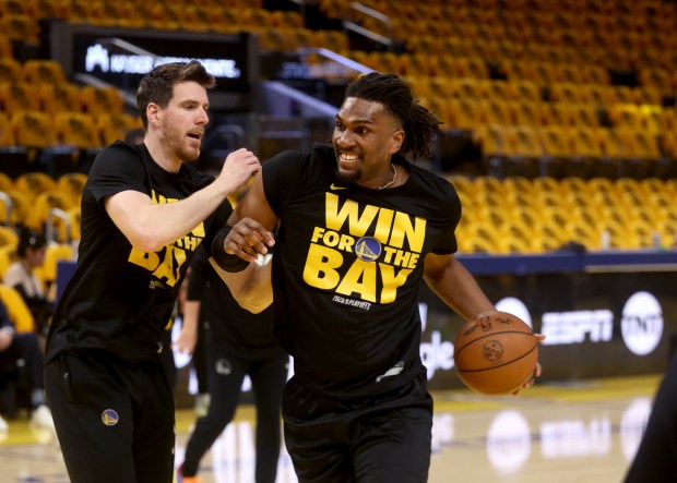Golden State Warriors' Kevon Looney #5warms up before their NBA Western Conference semifinal game against the Minnesota Timberwolves at the Chase Center in San Francisco, Calif., on Monday, May 12, 2025. (Jane Tyska/Bay Area News Group)