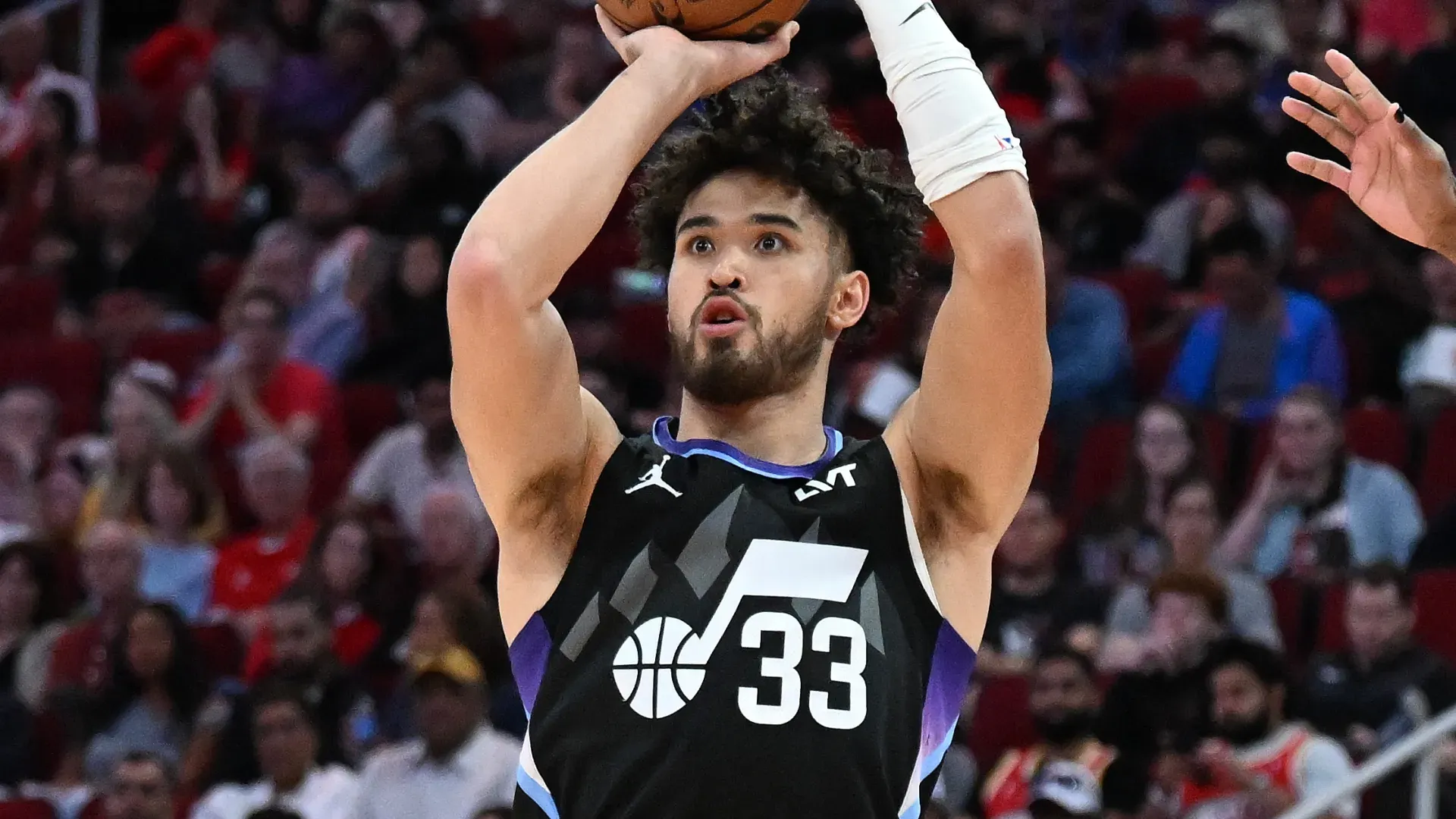 Johnny Juzang #33 of the Utah Jazz shoots a three pointer against the Houston Rockets