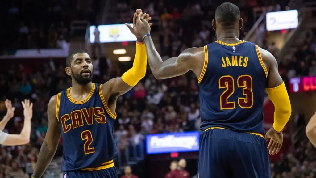 Kyrie Irving #2 and LeBron James #23 of the Cleveland Cavaliers celebrate after scoring during the first half against the Boston Celtics on 2016. (Jason Miller/Getty Images)