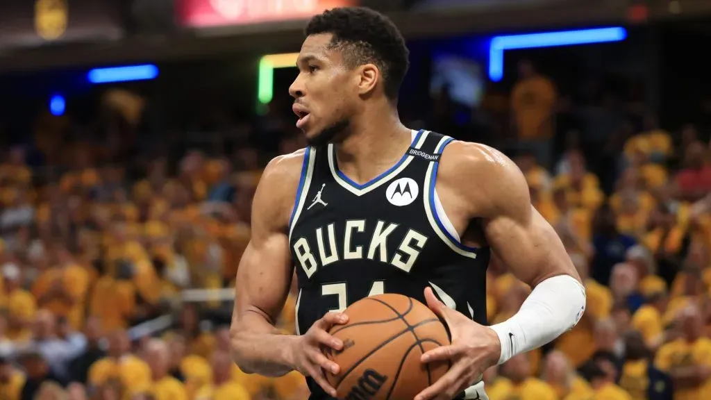 Giannis Antetokounmpo looks down