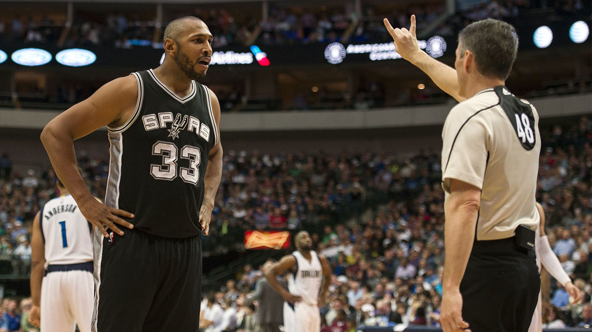 San Antonio Spurs center Boris Diaw (33) argues a call with referee Scott Foster (48) during the second half of the game against the Dallas Mavericks at the American Airlines Center. The Spurs defeat the Mavericks 96-91.