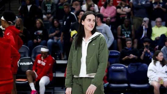 Caitlin Clark #22 of the Indiana Fever walks on the court before a game against the Minnesota Lynx at Target Center (Getty Images via AFP)