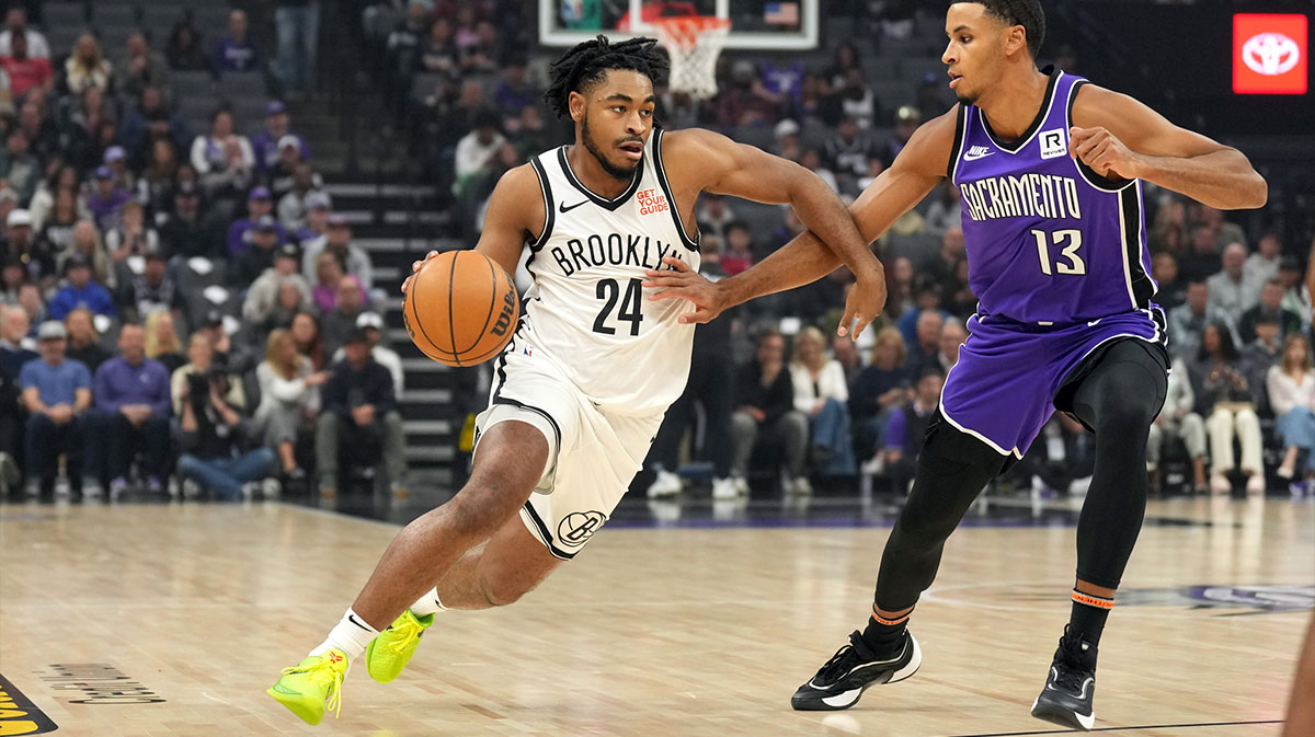 Brooklyn Nets guard Cam Thomas (24) dribbles against Sacramento Kings forward Keegan Murray (13) during the first quarter at Golden 1 Center.