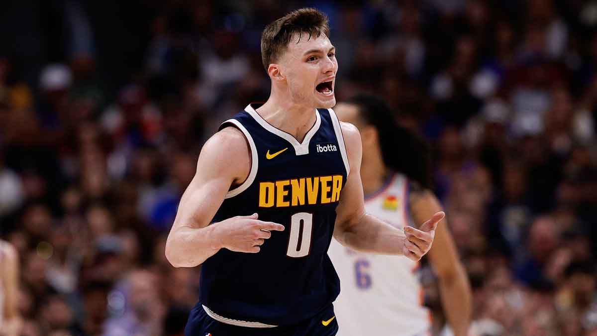 Denver Nuggets guard Christian Braun (0) reacts after a play in the second quarter against the Oklahoma City Thunder during game four of the second round of the 2025 NBA Playoffs at Ball Arena.
