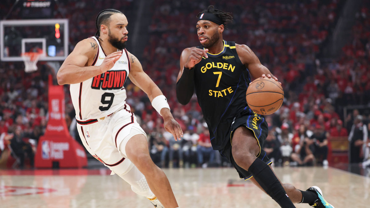 Golden State Warriors guard Buddy Hield (7) dribbles the ball as Houston Rockets forward Dillon Brooks (9) defends during the first quarter of game seven of the first round for the 2025 NBA Playoffs at Toyota Center. 