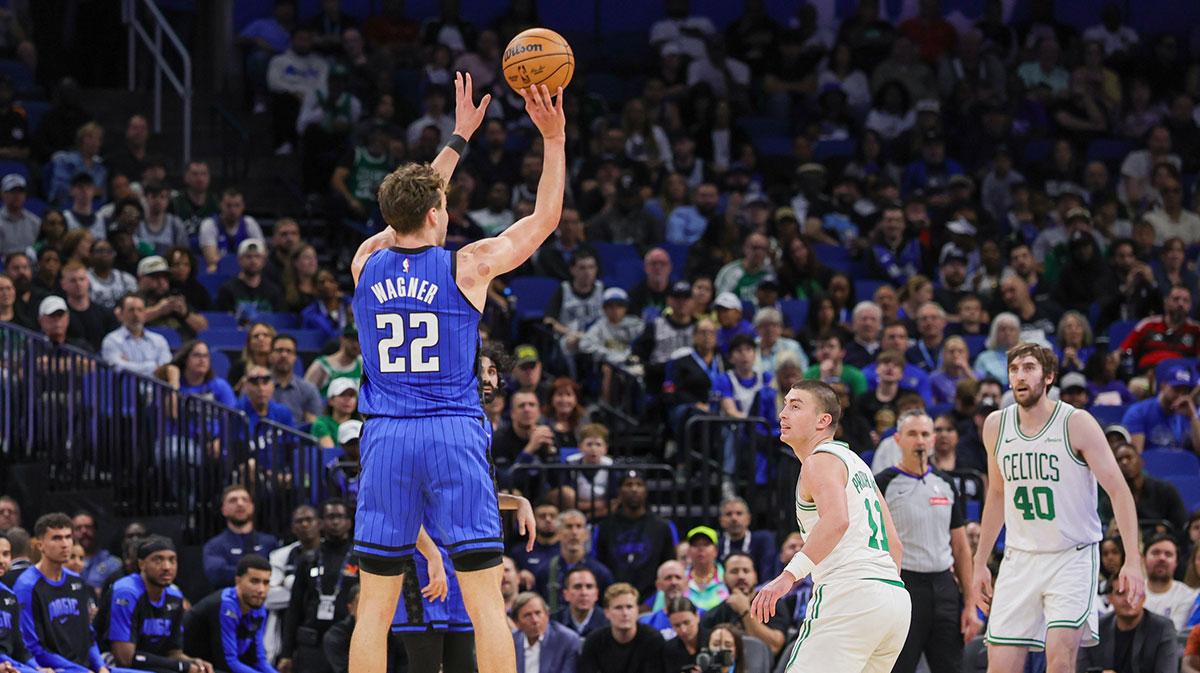 Orlando Magic forward Franz Wagner (22) shoots a three point basket during the second quarter against the Boston Celtics at Kia Center.