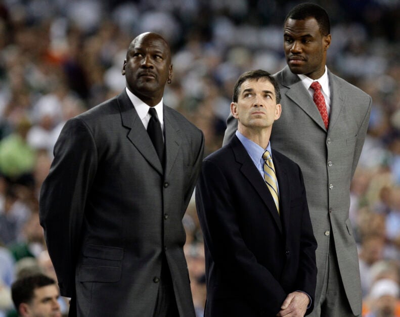 NBA Hall of Fame members Michael Jordan, left, John Stockton, center, and David Robinson takes part in festivities at the 2009 NCAA men's basketball championship.