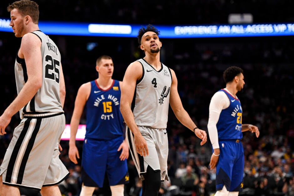 Derrick White of the San Antonio Spurs reacts to his fourth foul against the Denver Nuggets