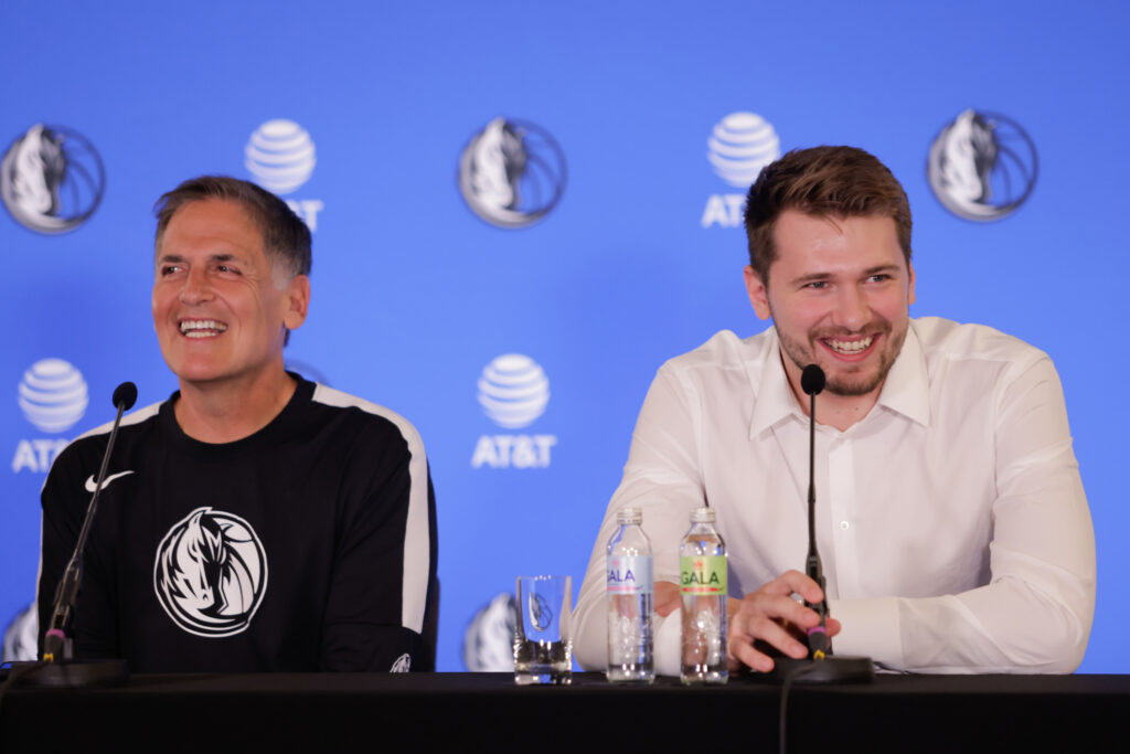 Dallas Mavericks owner Mark Cuban and Luka Doncic speak at a press conference.