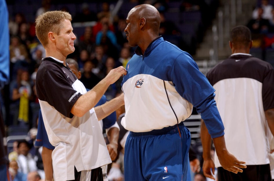San Antonio Spurs guard Steve Kerr confers with Washington Wizards guard Michael Jordan