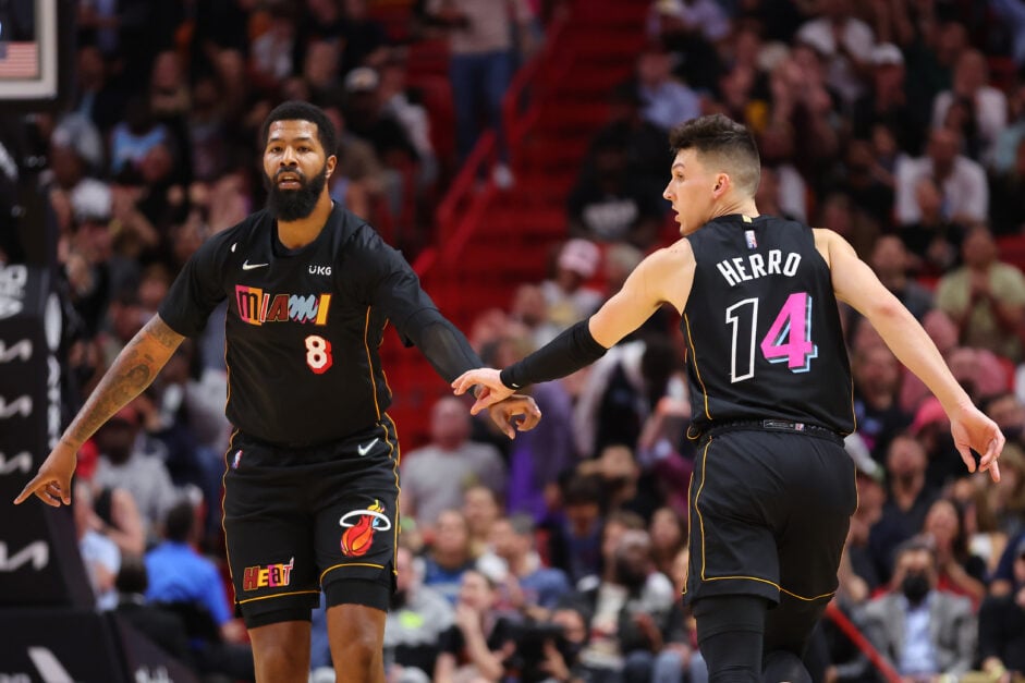 Markieff Morris #8 and Tyler Herro #14 of the Miami Heat celebrate a three pointer against the Minnesota Timberwolves at FTX Arena on March 12, 2022 in Miami, Florida.