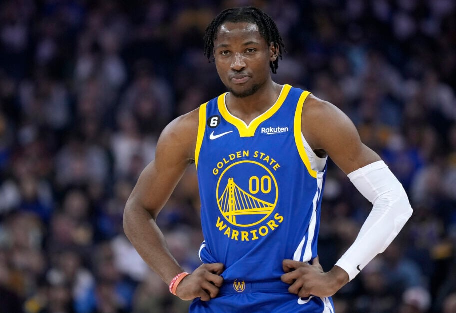 Jonathan Kuminga #00 of the Golden State Warriors looks on against the Portland Trail Blazers.