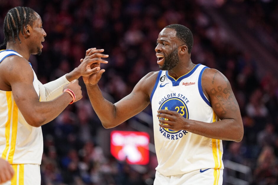 Golden State Warriors forwards Draymond Green and Jonathan Kuminga celebrate