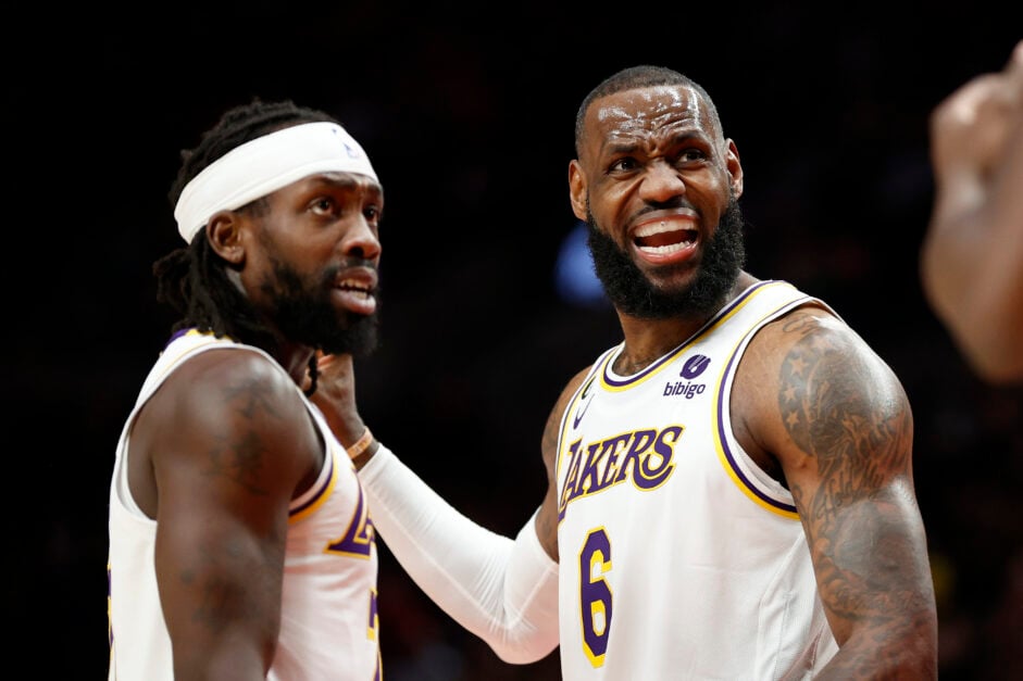 LeBron James #6 and Patrick Beverley #21 of the Los Angeles Lakers react during the third quarter against the Portland Trail Blazers at Moda Center.