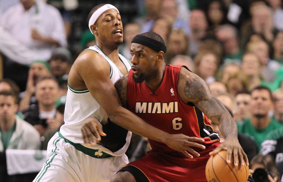 Boston Celtics small forward Paul Pierce (#34) tries to block Miami Heat small forward LeBron James (#6) in the first quarter. Boston Celtics NBA basketball, action and reaction. The Celtics play the Miami Heat in game six of the Eastern Conference Finals at TD Garden.