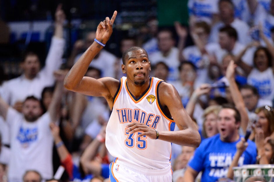 Kevin Durant #35 of the Oklahoma City Thunder reacts after making a basket in the third quarter while taking on the Miami Heat in Game Two of the 2012 NBA Finals at Chesapeake Energy Arena.
