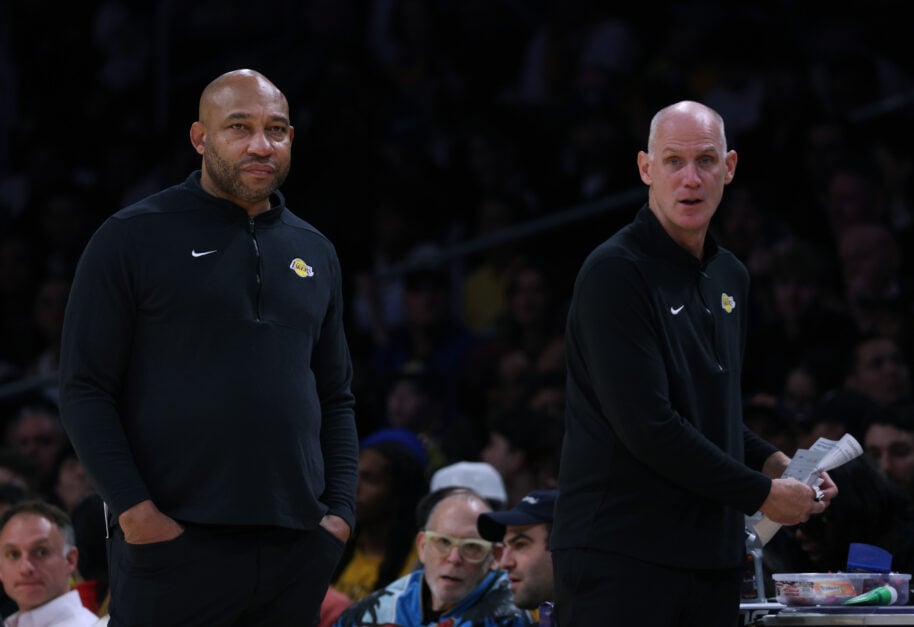 Darvin Ham and Chris Jent on the sidelines during a 114-109 loss to the New York Knicks at Crypto.com Arena on December 18, 2023 in Los Angeles, California.