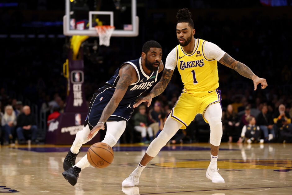 Kyrie Irving #11 of the Dallas Mavericks drives past D'Angelo Russell #1 of the Los Angeles Lakers during the second quarter at Crypto.com Arena on January 17, 2024 in Los Angeles, California.