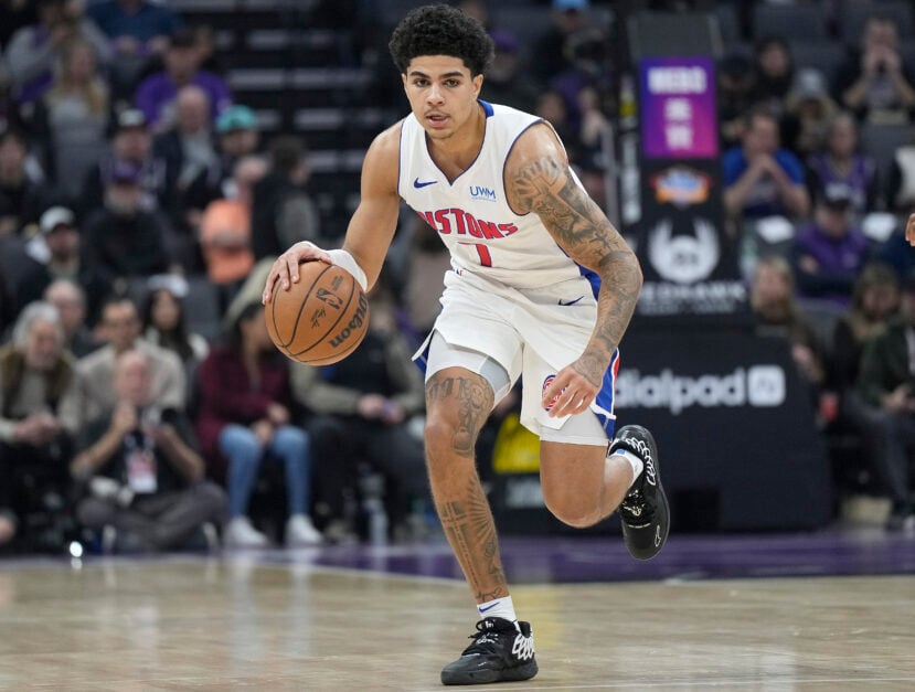 Detroit Pistons point guard Killian Hayes dribbles up the court.