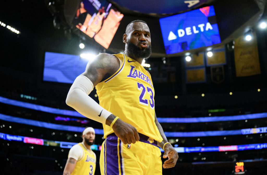 Los Angeles Lakers forward LeBron James (23) reacts after scoring on a fast break layup