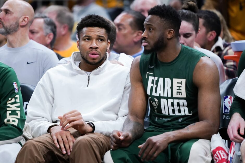 Giannis Antetokounmpo #34 and Thanasis Antetokounmpo #43 of the Milwaukee Bucks look on from the bench in the fourth quarter against the Indiana Pacers during game three of the Eastern Conference First Round Playoffs at Gainbridge Fieldhouse on April 26, 2024