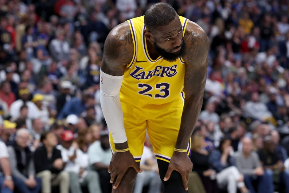 LeBron James #23 of the Los Angeles Lakers gathers himself with hands on knees.