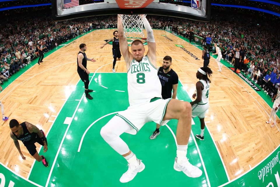 BOSTON, MASSACHUSETTS - JUNE 06: Kristaps Porzingis #8 of the Boston Celtics dunks the ball during the first quarter against the Dallas Mavericks in Game One of the 2024 NBA Finals at TD Garden on June 06, 2024 in Boston, Massachusetts. NOTE TO USER: User expressly acknowledges and agrees that, by downloading and or using this photograph, User is consenting to the terms and conditions of the Getty Images License Agreement. (Photo by Maddie Meyer/Getty Images)