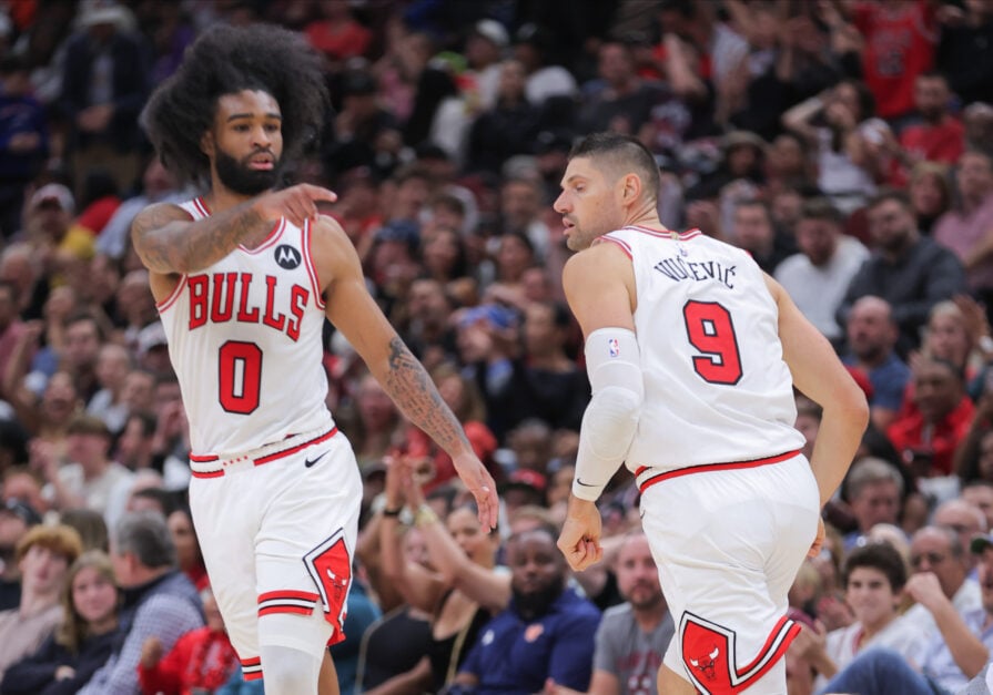 Chicago Bulls guard Coby White (0) and Chicago Bulls center Nikola Vucevic (9) during the second half against the Orlando Magic.