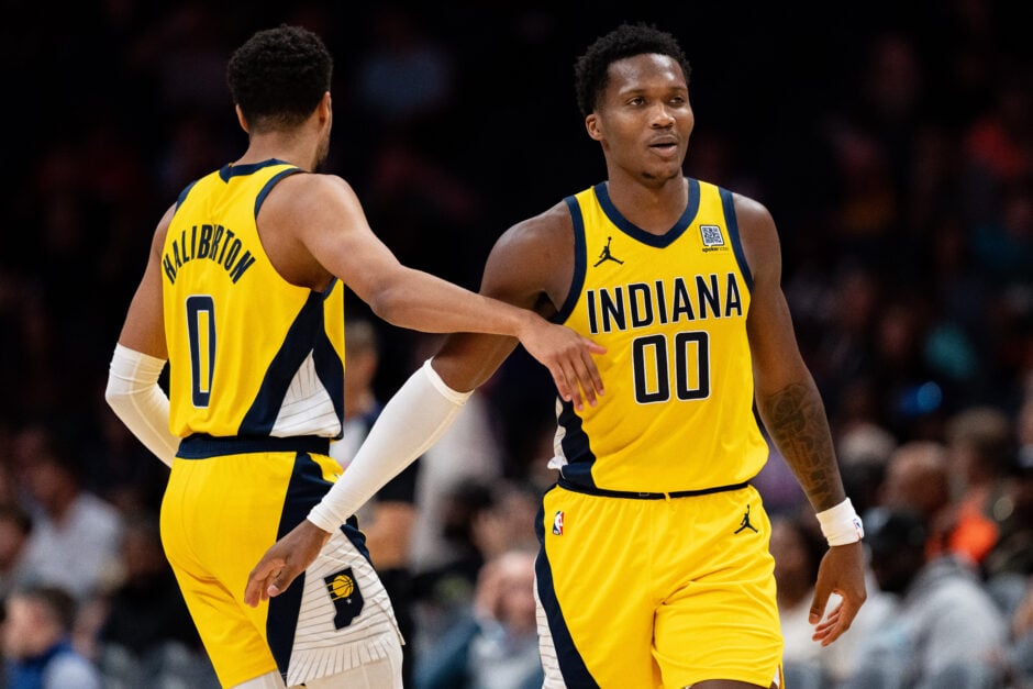 Tyrese Haliburton #0 of the Indiana Pacers celebrates with Bennedict Mathurin #00 during their game against the Charlotte Hornets at Spectrum Center on November 08, 2024 in Charlotte, North Carolina.