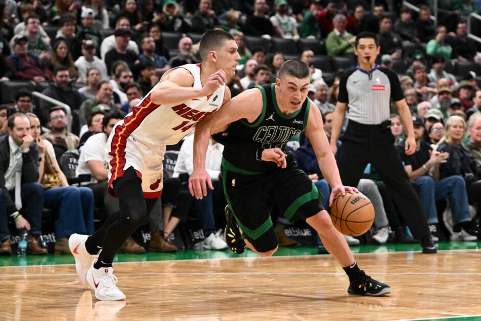 Miami Heat guard Tyler Herro defends Boston Celtics guard Payton Pritchard