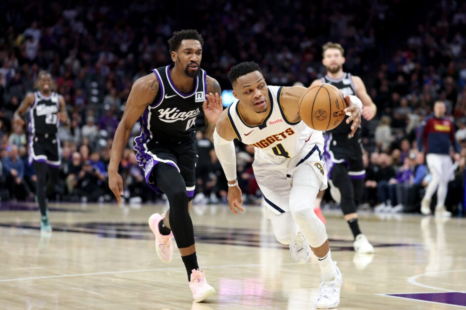 Russell Westbrook #4 of the Denver Nuggets steals the ball from Malik Monk #0 of the Sacramento Kings in the first half at Golden 1 Center on December 16, 2024 in Sacramento, California.