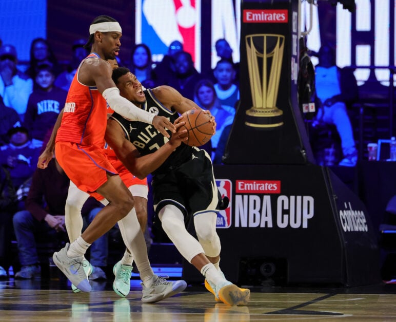 Giannis Antetokounmpo #34 of the Milwaukee Bucks is fouled by Shai Gilgeous-Alexander #2 of the Oklahoma City Thunder in the third quarter of the championship game of the Emirates NBA Cup at T-Mobile Arena on December 17, 2024 in Las Vegas, Nevada.